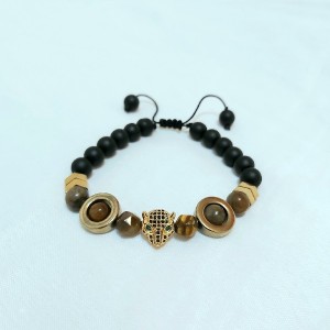 دستبند مردانه سنگ چشم ببر و حدید طلایی و سر ببرسوارسکی زیورآلات مردانه-72614